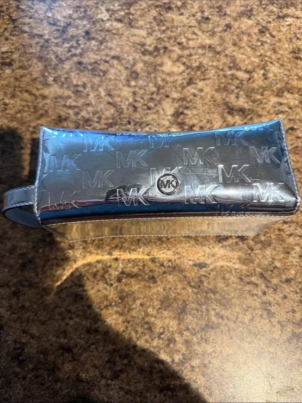 Michael Kors Metallic Silver MK Embossed Cosmetic Case